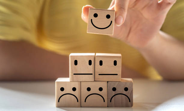 istock Human hold wood emotion smile, give feedback icon satisfaction survey, five star, customer, satisfaction, review, feedback, service excellent, Quality assurance 5 star, positive, customer service 1647737988
