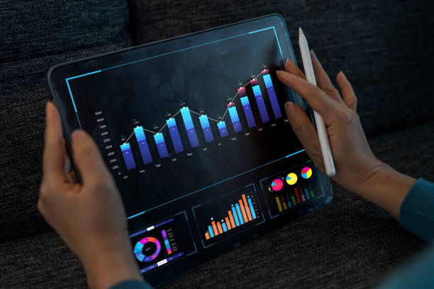 istock People use tablet with business analyzing and data management system and make report with KPI, strategy, finance, sales, marketing, money, business growth, financial investment graph 1647738006