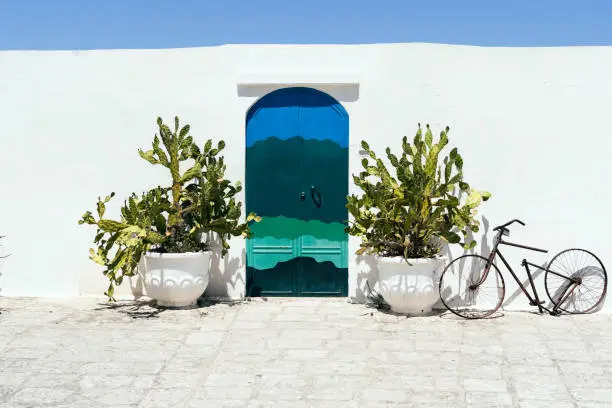 Blue door in Ostuni, village in the Puglia region, southern Italy
Tourism