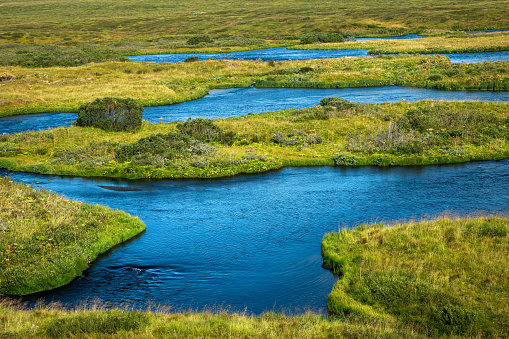 Idyllic Laxa river in Iceland on a sunny summer day.