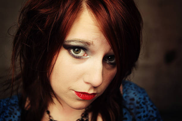 istock Shy young woman 164778298
