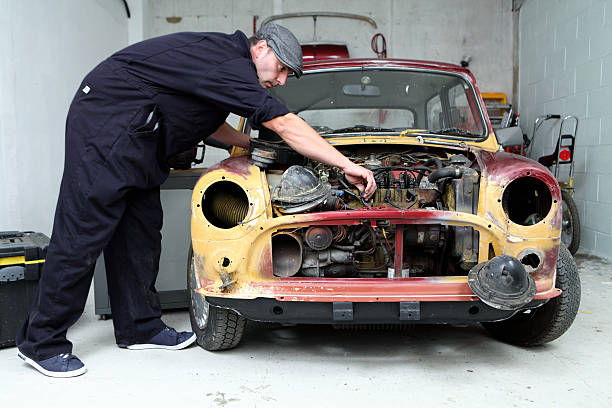 istock Mechanic in his garage. 164778351