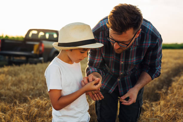 istock father and son outdoor in field 1647804209