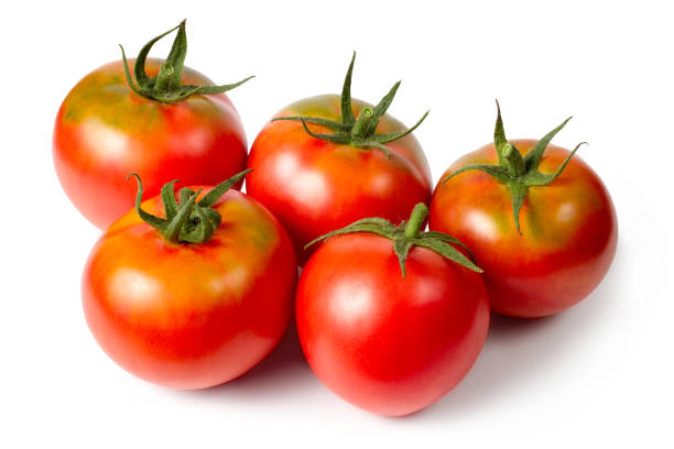 istock A group of natural tomatoes on a white background. 1647828668