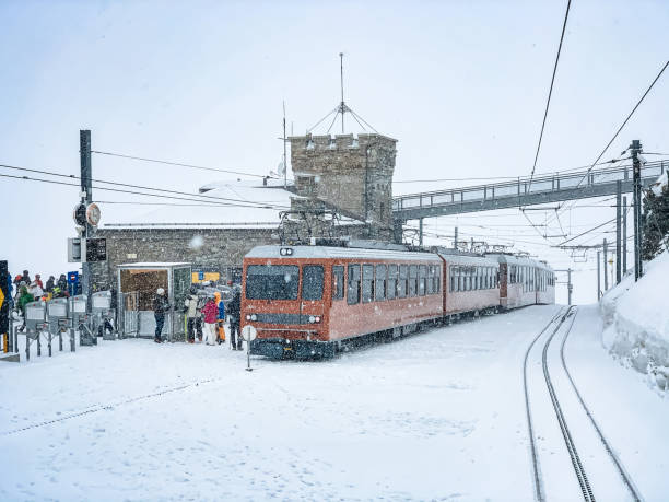 People at Gornergrat railway station (3.089 m) above Zermatt town in Mattertal, Valais canton, Switzerland, in winter.