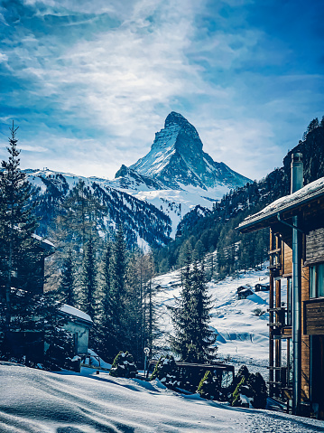 World famous Zermatt town with Matterhorn peak in Mattertal, Valais canton, Switzerland, at dusk in winter. Taken by Sony a7R II, 42 Mpix.