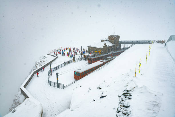 People at Gornergrat railway station (3.089 m) above Zermatt town in Mattertal, Valais canton, Switzerland, in winter. Taken by Sony a7R II, 42 Mpix.