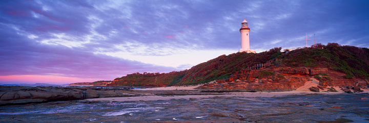Wide angle panoramic view of Norah Head Lighthouse on sunrise on the Central Coast, NSW.