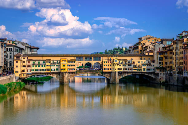 istock Ponte Vecchio in Florence, Italy. Reflections on the river Arno 1647916713