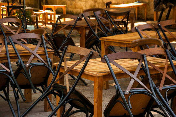 istock Wooden chairs and tables in empty cafe 1647922790