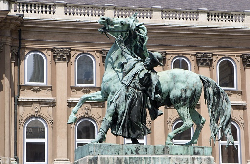 Horse Wrangler - The statue of the Hortobagy ostler - Csikos in the court of Buda castle in Budapest Hungary by György Vastagh