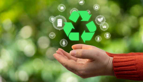 istock Hand holding recycle, recycling saving clean energy earth globe, reduce, reuse, environment, green, eco friendly, save planet, sustain, ecosystem.campaign save the earth, earth Day 22 April 1647923937