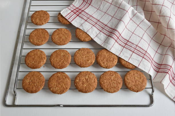 istock Freshly baked cookies on metal greed 1647947062