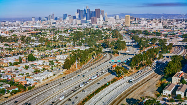istock Traffic on highway amidst city 1647949114