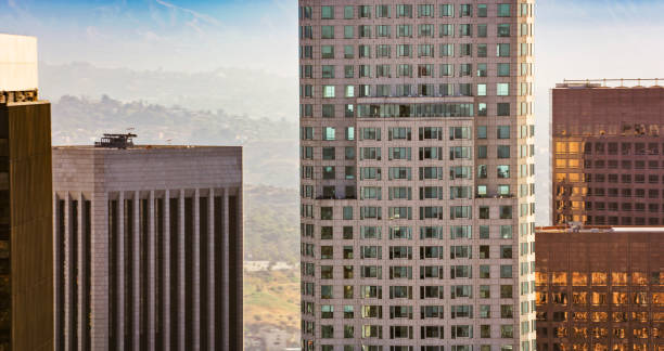 Aerial view of modern office building against mountains, City Of Los Angeles, California, USA.