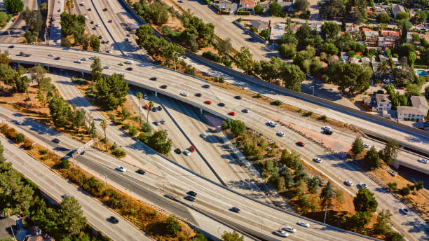 istock Vehicles driving on multi-lane road 1647949151