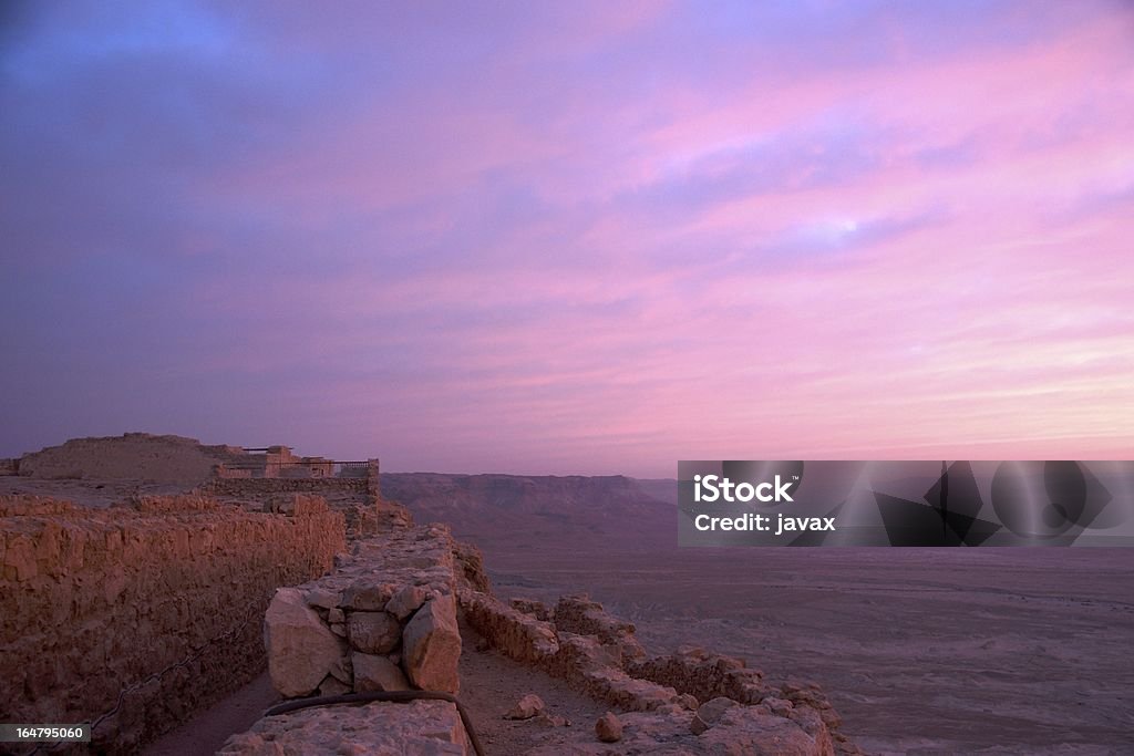 Masada fortress and Dead sea sunrise Masada fortress and Dead sea sunrise in Israel judean desert tourism Archaeology Stock Photo