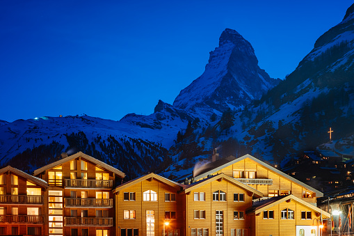 World famous Zermatt town with Matterhorn peak in Mattertal, Valais canton, Switzerland, at dusk in winter. Taken by Sony a7R II, 42 Mpix.