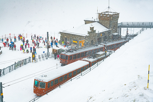 People at Gornergrat railway station (3.089 m) above Zermatt town in Mattertal, Valais canton, Switzerland, in winter. Taken by Sony a7R II, 42 Mpix.