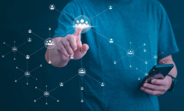 istock Businessman showing clients on holographic global network structure and the exchange of information, the concept of connecting information around the world with technology internet, digital marketing 1647992617