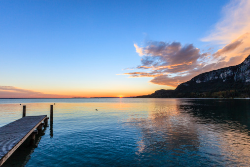 The natural harbor of Garda at sunset. Garda is one of the beautiful towns on the shores of Lake Garda, the largest Italian lake and a major tourist destination.