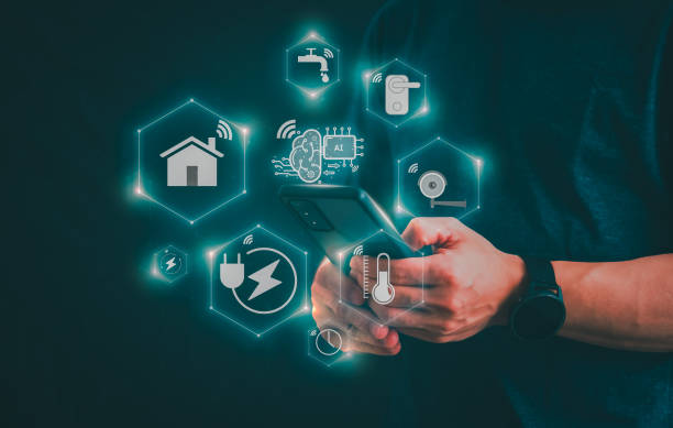 istock Man using a smartphone, controlling an intelligent home automation system Futuristic interface on a virtual screen Automation technology of things, concept Data connection with technology internet. 1648006401