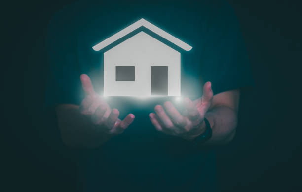 istock Man using a smartphone, controlling an intelligent home automation system Futuristic interface on a virtual screen Automation technology of things, concept Data connection with technology internet. 1648006488