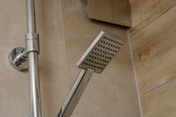 istock Shower in the bathroom with running water 1648012965