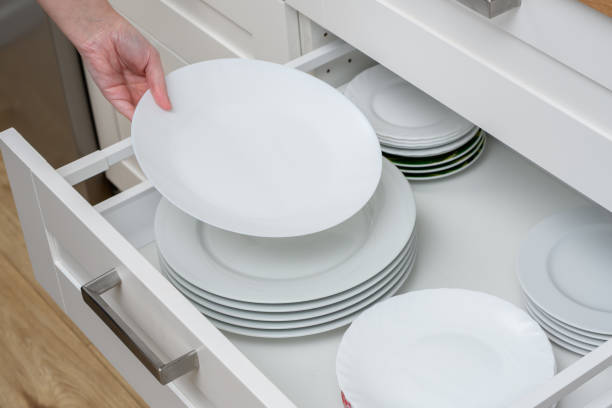 istock Take dinner plates out of the kitchen drawer 1648016800