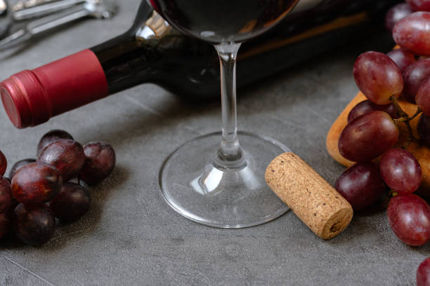 istock Glass of red wine and bottle and fresh crape 1648022022