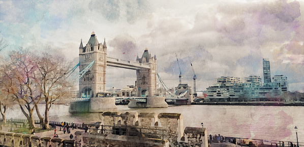 Watercolor painting effect on a real photo of London Tower bridge on river Thames and the pedestrian walkaway, parks, trees by the river. Watercolor effect on a real photography.