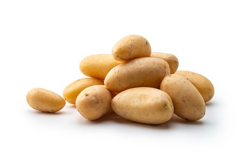 Isolated potatoes. Cut raw potato vegetables isolated on white background with clipping path