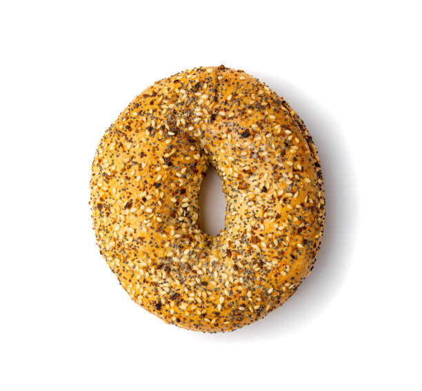 istock Bagel, Round Bread Bun, Wheat Bakery with Grains And Seeds for Breakfast, Plain Circle Bagel Bread 1648044197