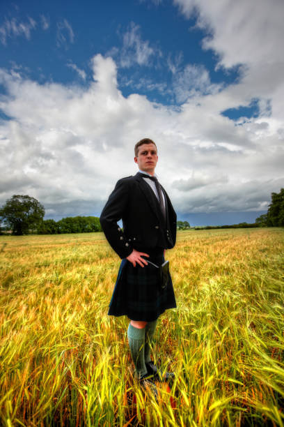 istock Proud scotsman in cornfield wearing kilt 164805314