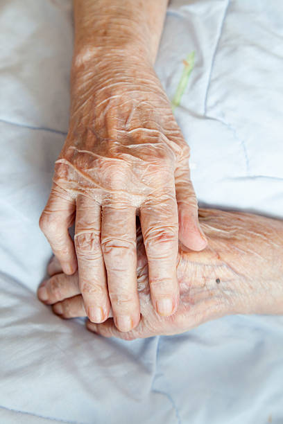 istock Hands of elderly lady 164805463