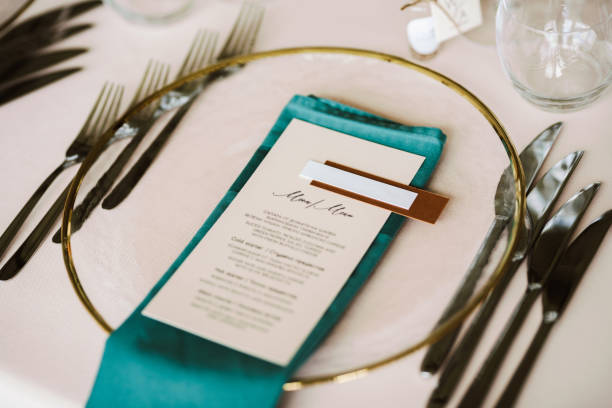 istock Table set up for a special event and a Menu list. 1648054727