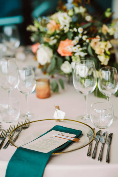 istock Table set up for a special event and a Menu list. 1648054829