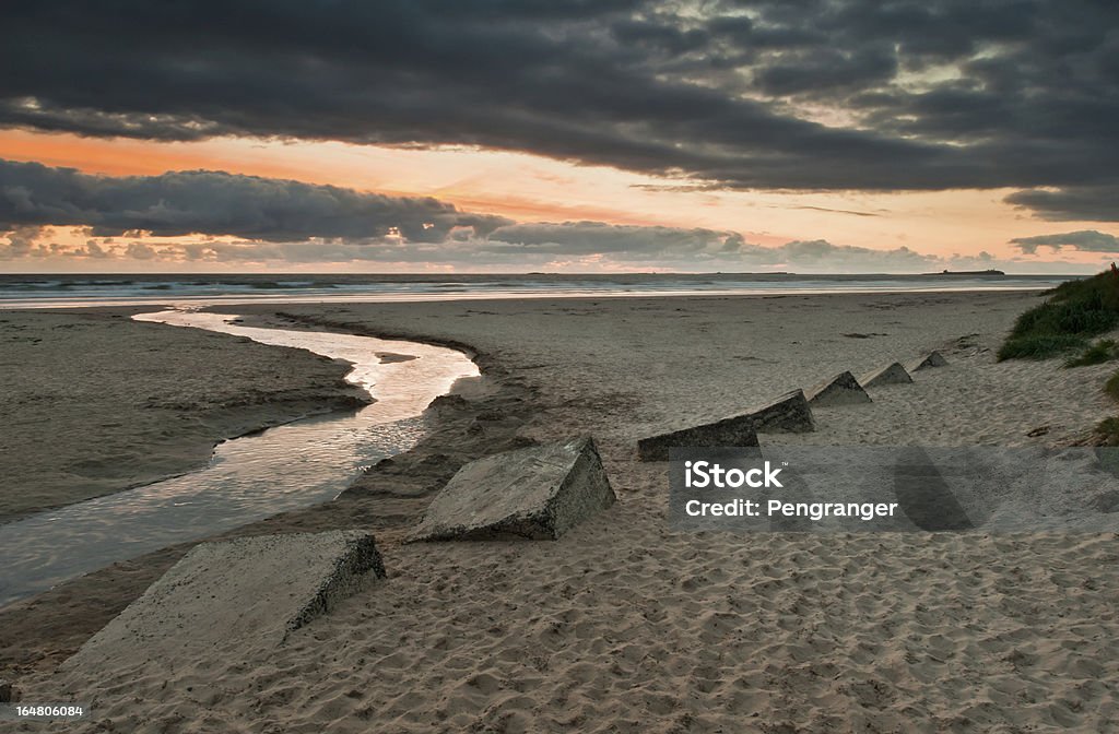 Bamburgh praia ao pôr-do-sol - Foto de stock de 2000-2009 royalty-free