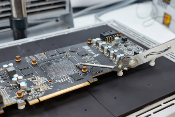 istock A video card with a freshly soldered GPU chip using an infrared soldering station. Maintenance and repair of computer equipment. 1648084962