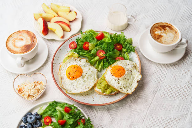 istock healthy breakfast bread Avocado Fried Egg and Salad 1648097757