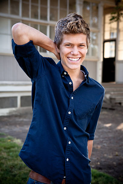 istock Young man posing and laughing in the camera 164809850