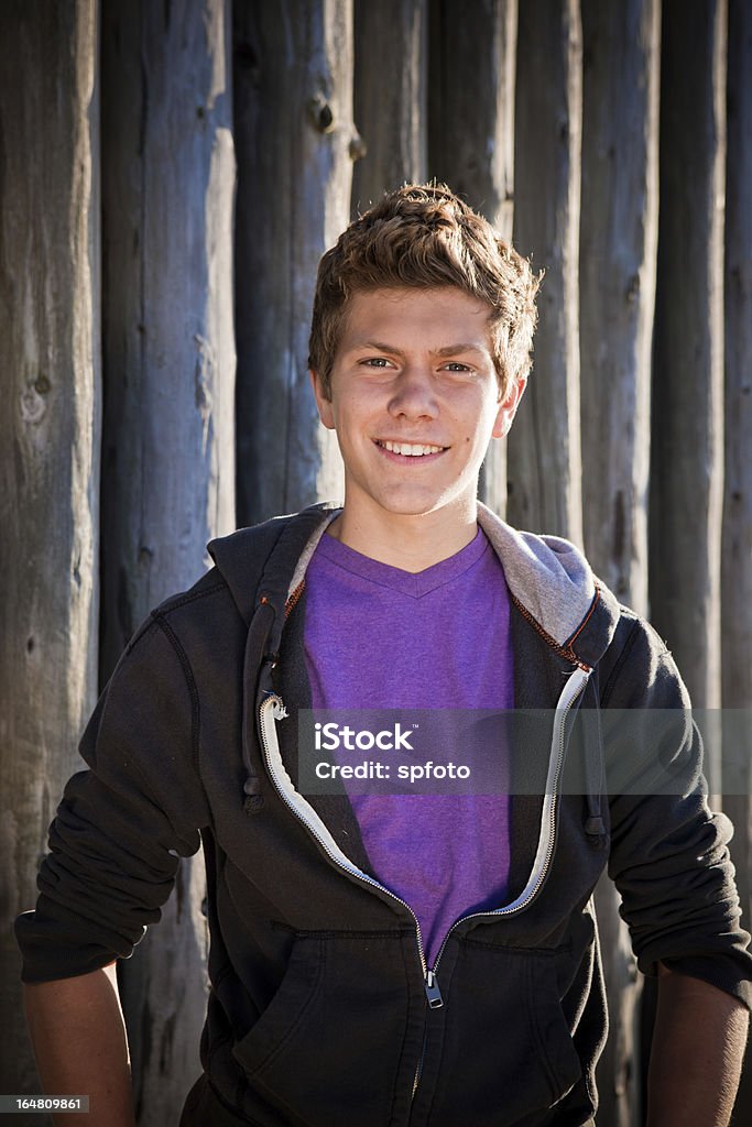 Laughing A playful portrait of a young man laughing. 18-19 Years Stock Photo