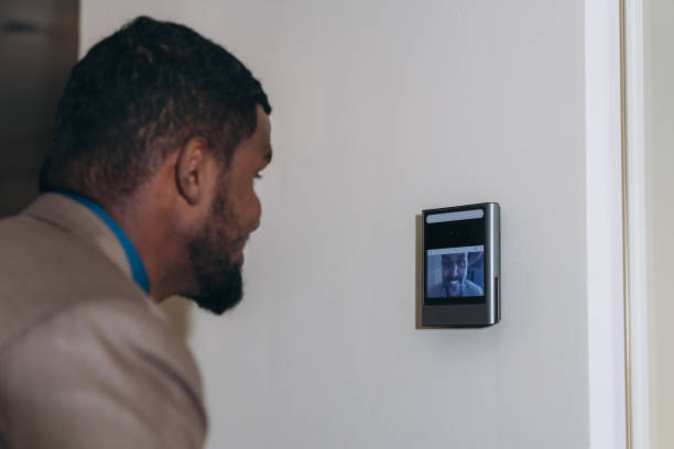 istock A face scanner being used by a man to open a door at an office building. Control device for Security system. Device to control a security system. 1648109550