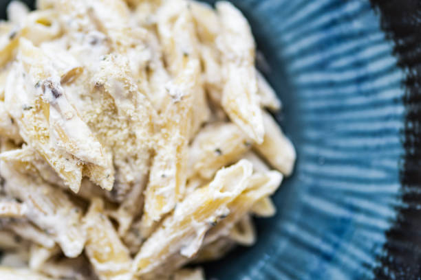 Close-up of pasta with mushrooms and cheese