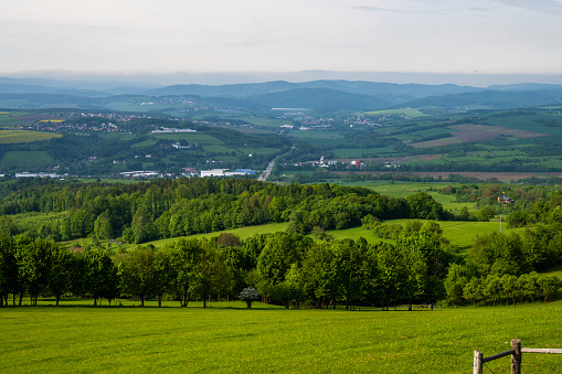 Green hilly landscape, woods, meadows and village, Lipa near Zlin, Czech republic. Springtime.