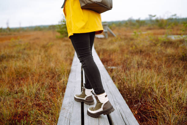 istock Close-up of woman's legs in boots. 1648136213