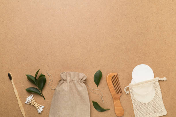 istock Flat lay with natural biodegradable accessories on wooden background, top view 1648152586