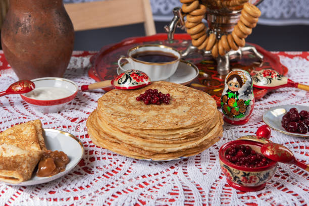 istock Russian pancake blini with berries and sour cream 1648165985