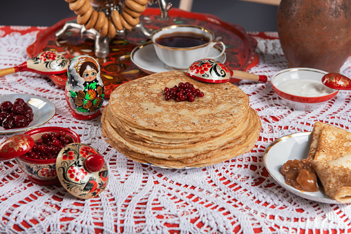 Russian pancake blini with berries and sour cream