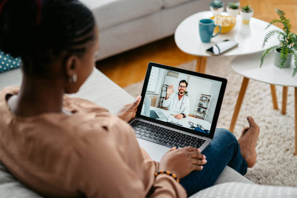 istock Young Woman Having A Doctor's Appointment Online At Home 1648174720